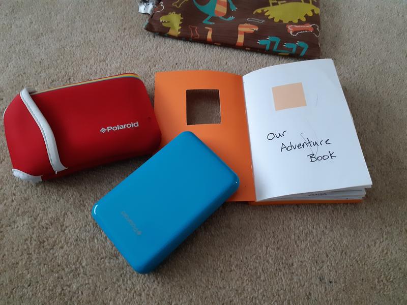 Blue Polaroid Printer with notebook