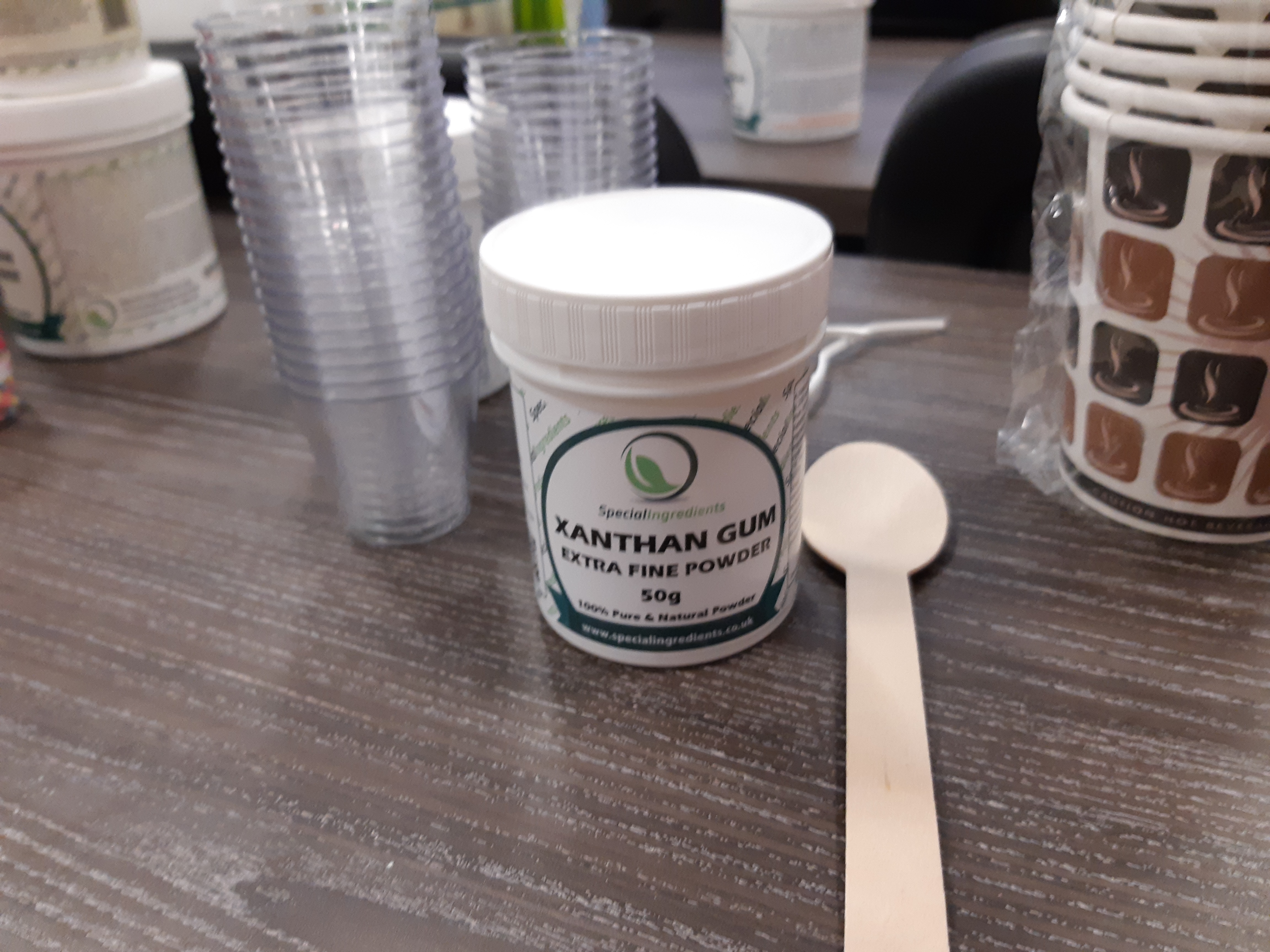 Small container of Xanthan Gum.