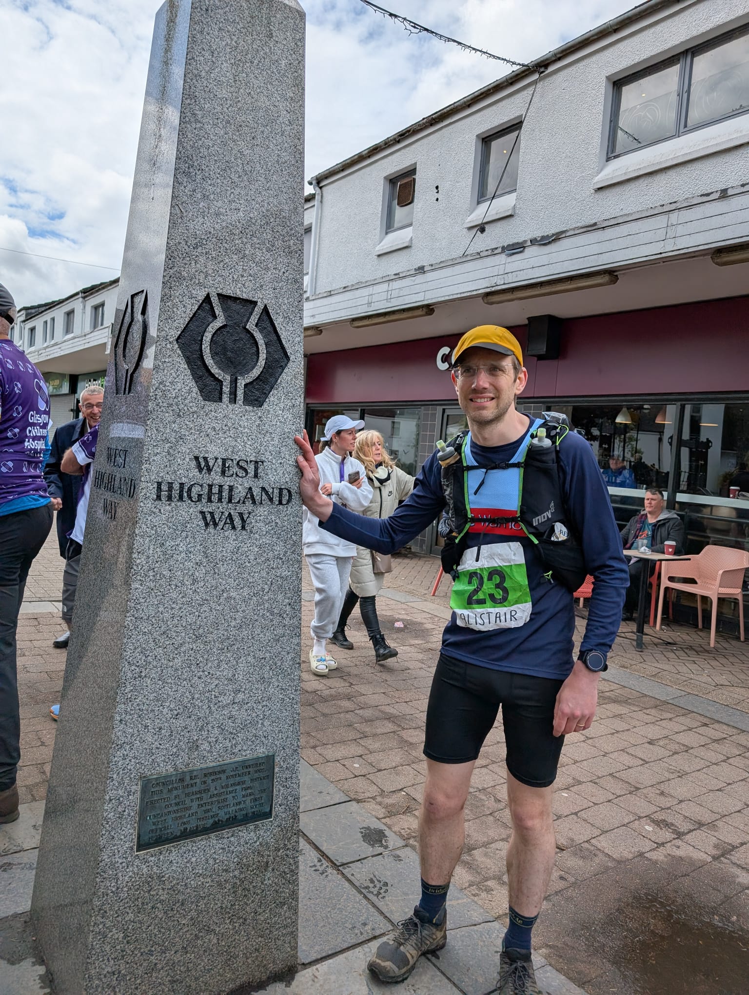 Alistair standing beside the obelisk in Milngavie