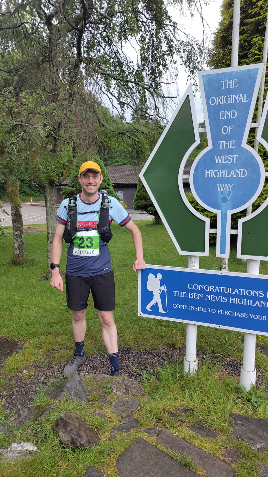 Alistair standing beside the 'Original end of the West Highland Way'