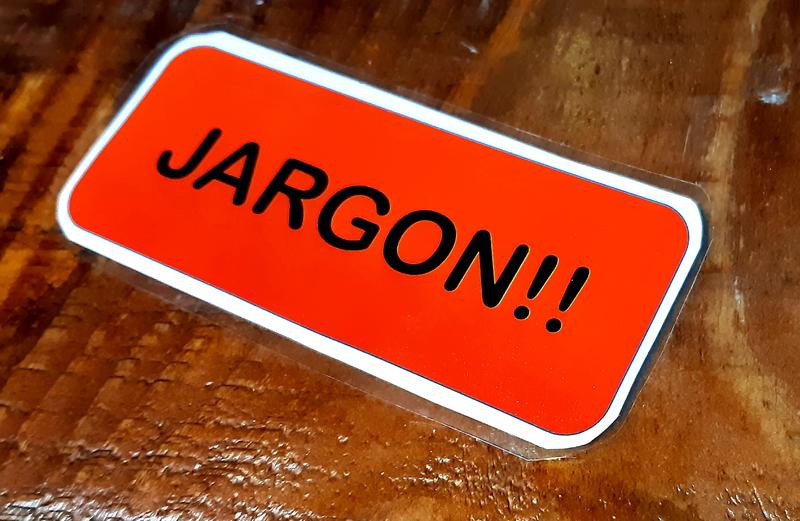 A laminated card with the word 'Jargon' written on it.
